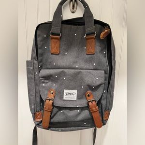 Gray canvas polkadot backpack. Great condition.